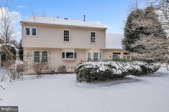 view of snow covered property