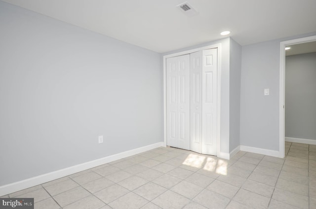 unfurnished bedroom featuring a closet