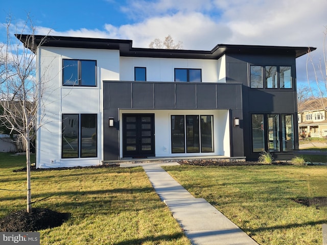 modern home with a front yard