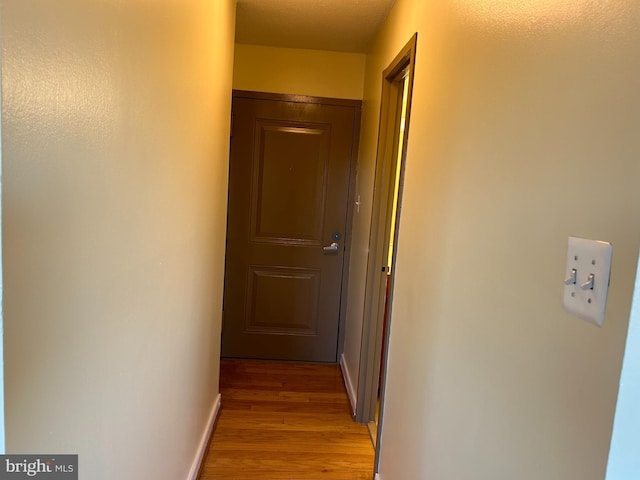 hallway featuring light wood-type flooring