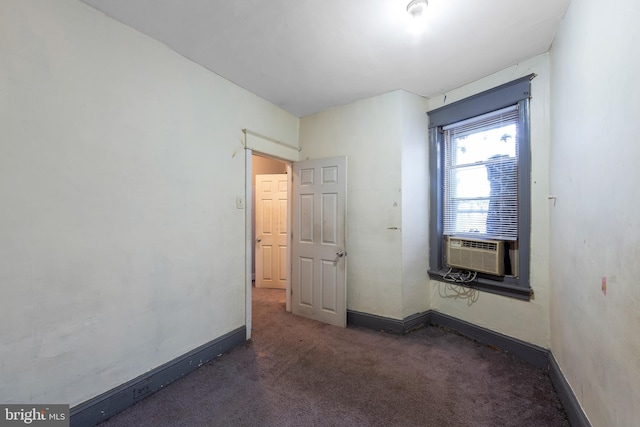 carpeted empty room featuring cooling unit