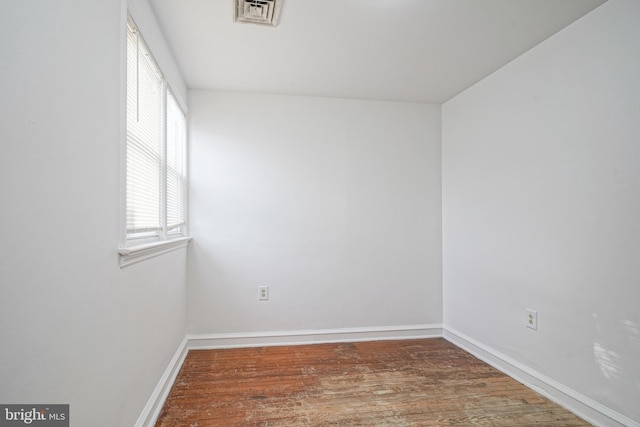 empty room featuring hardwood / wood-style floors