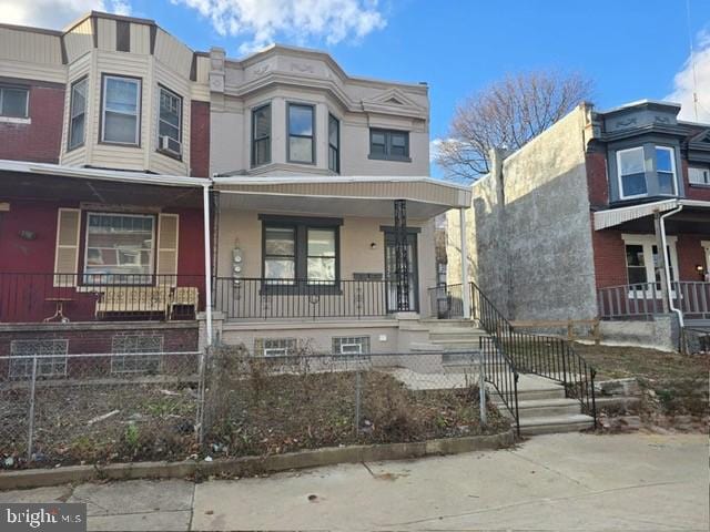 view of property featuring a porch