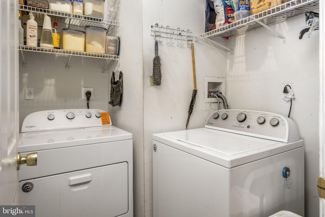 laundry room with independent washer and dryer