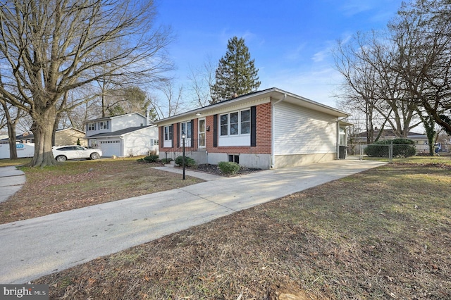 view of front facade featuring a garage and a front lawn