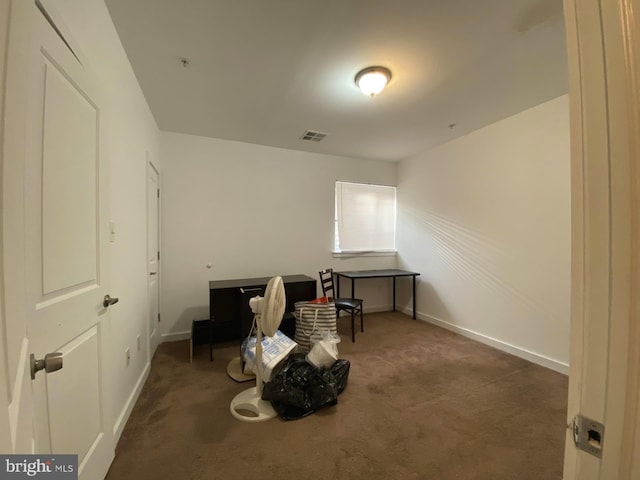 sitting room with dark carpet