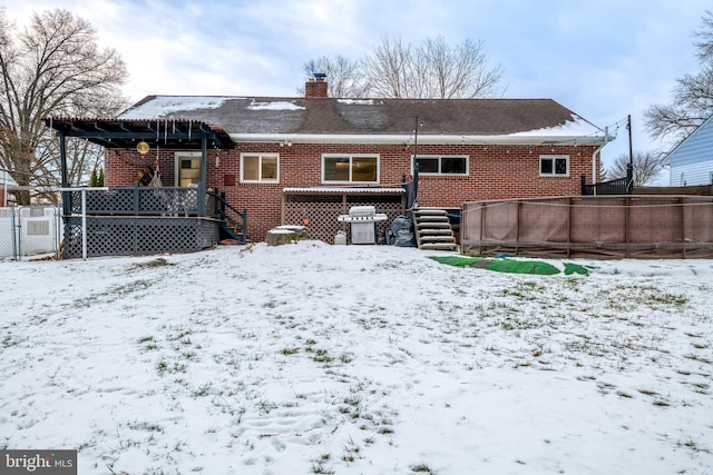 view of snow covered property