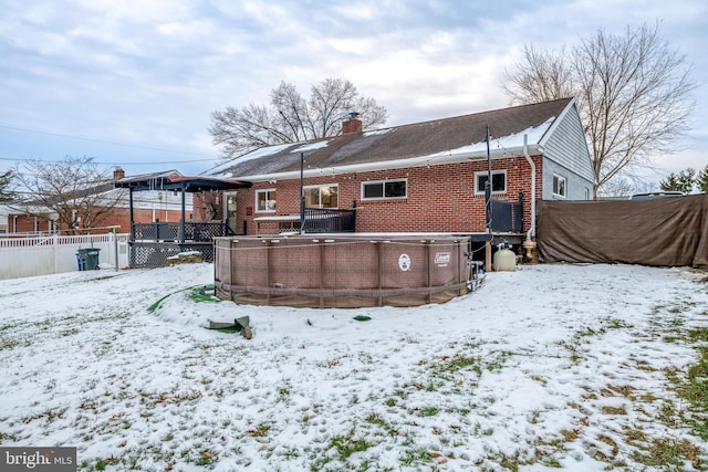 view of snow covered property