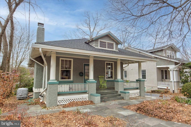 view of front of property featuring covered porch