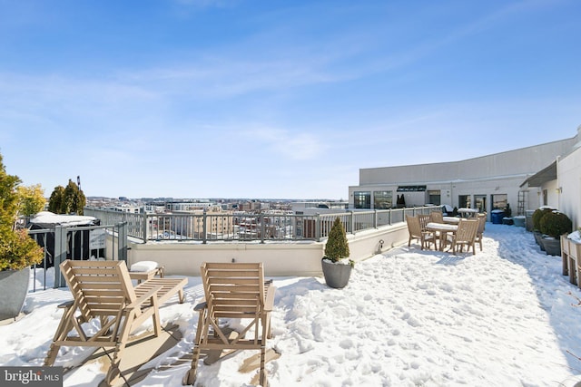 view of snow covered patio