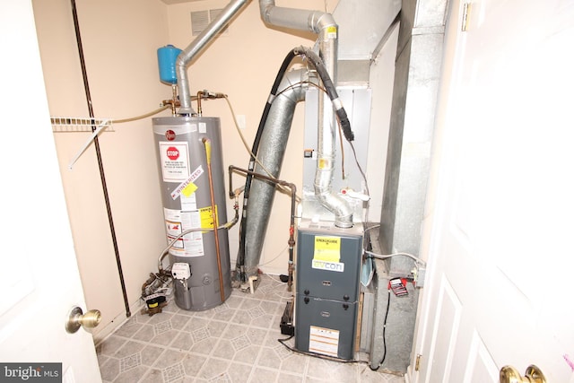 utility room with water heater