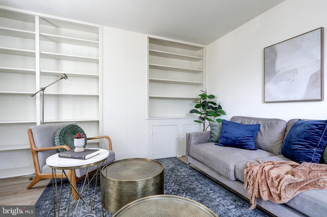 living area with wood finished floors