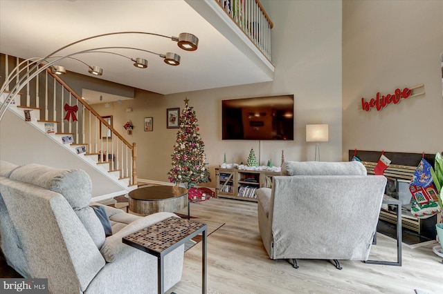 living room with light hardwood / wood-style flooring