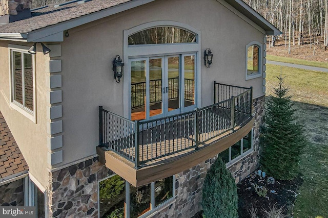 wooden terrace featuring french doors