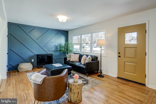 living room with light hardwood / wood-style flooring