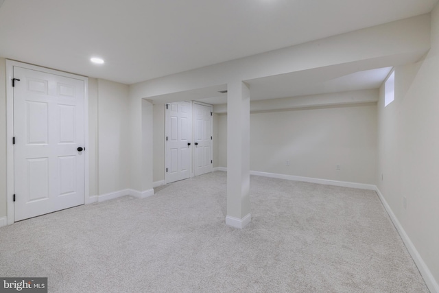 basement with light carpet