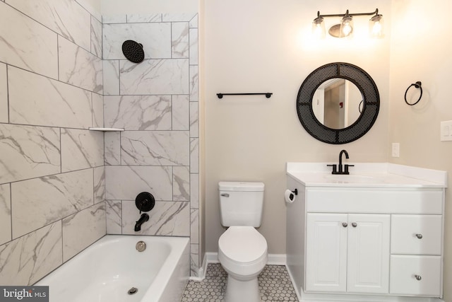 full bathroom featuring tile patterned floors, vanity, toilet, and tiled shower / bath