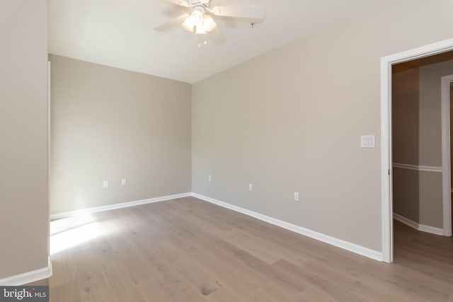 unfurnished room featuring light hardwood / wood-style floors and ceiling fan