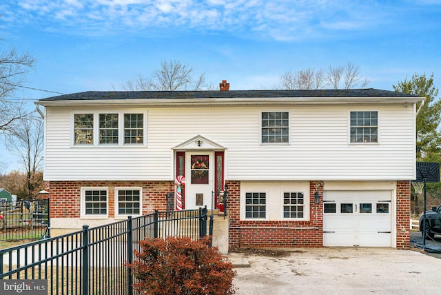 bi-level home with a garage