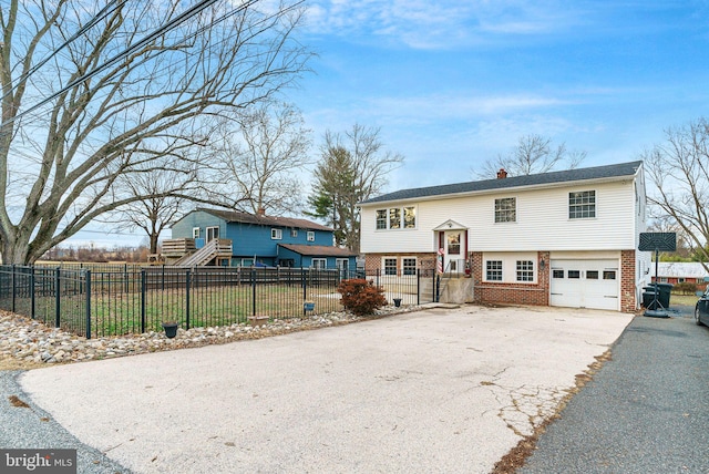 raised ranch with a garage