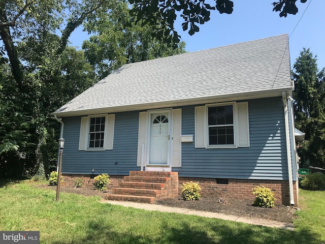 view of front of property with a front yard