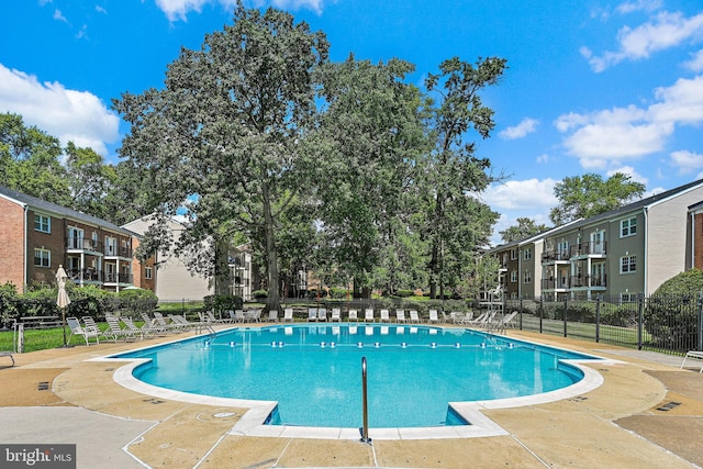 view of swimming pool featuring a patio