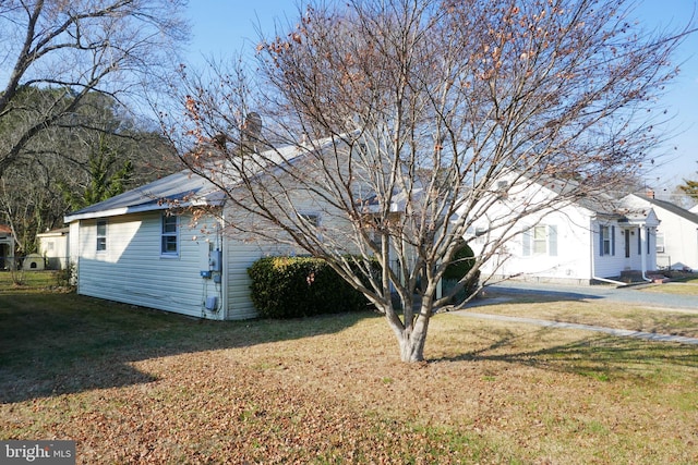 exterior space with a lawn