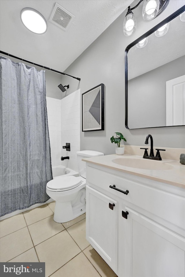 full bathroom featuring tile patterned floors, vanity, toilet, and shower / tub combo with curtain