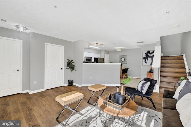 living room featuring wood-type flooring