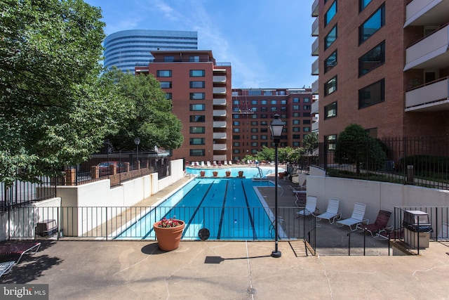 view of pool featuring a patio area