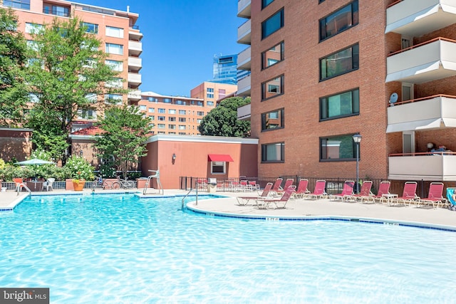 view of swimming pool featuring a patio