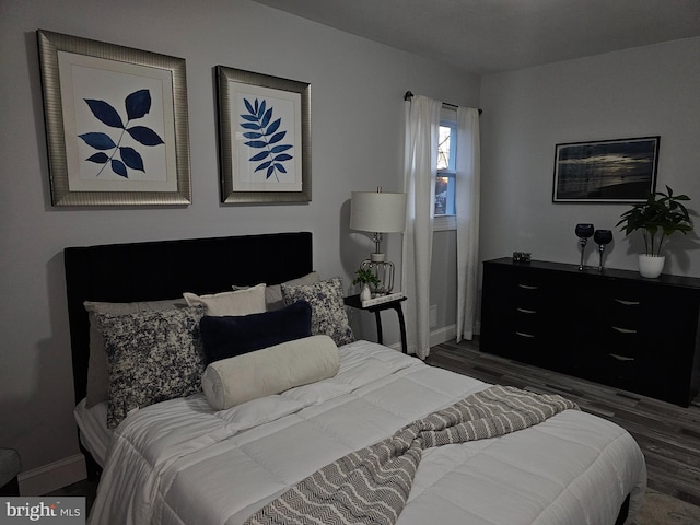 bedroom featuring dark hardwood / wood-style floors