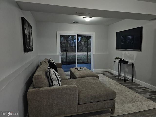 living room featuring dark hardwood / wood-style floors