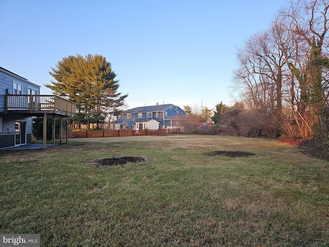 view of yard featuring a wooden deck