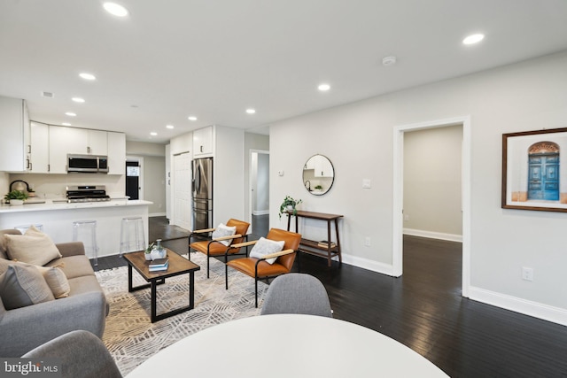 living room with dark wood-type flooring