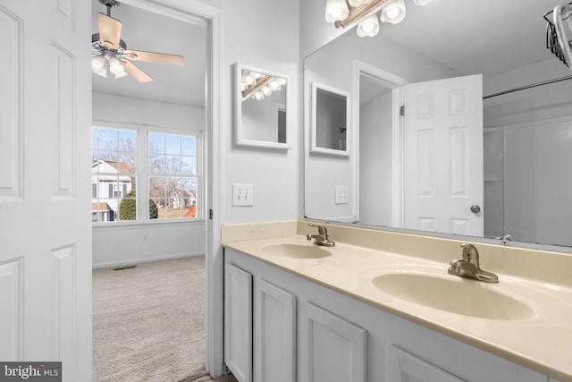 bathroom featuring vanity and ceiling fan