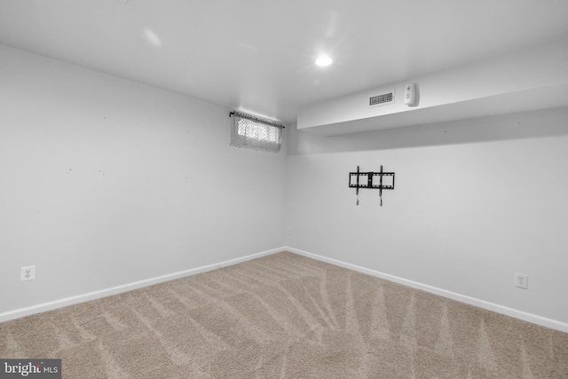 basement with carpet floors