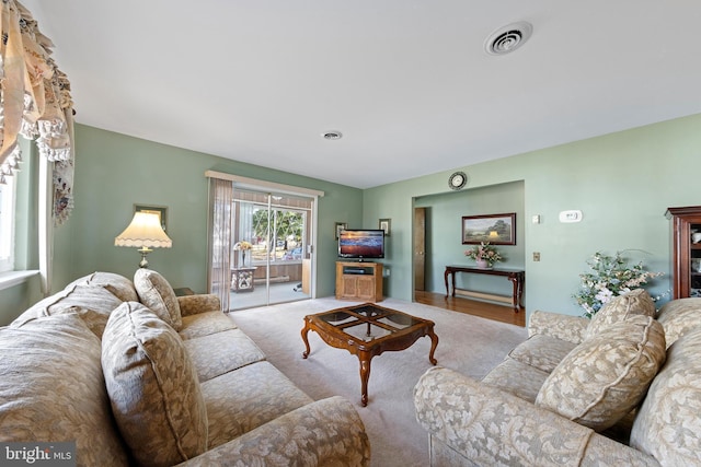 living room with light carpet