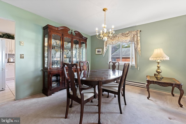 carpeted dining area featuring an inviting chandelier