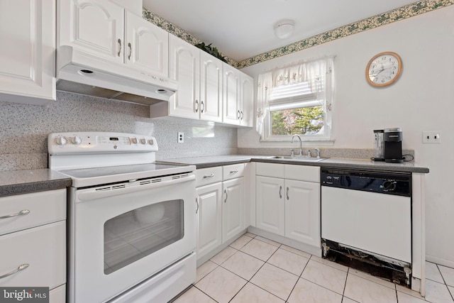 kitchen with sink, light tile patterned flooring, white appliances, decorative backsplash, and white cabinets