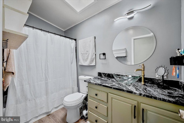 2612 Oakwood Ct, East Stroudsburg, PA 18302 - bathroom featuring ornamental molding, vanity, hardwood / wood-style floors, toilet, and lofted ceiling