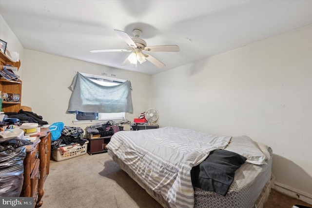 bedroom with ceiling fan and light colored carpet