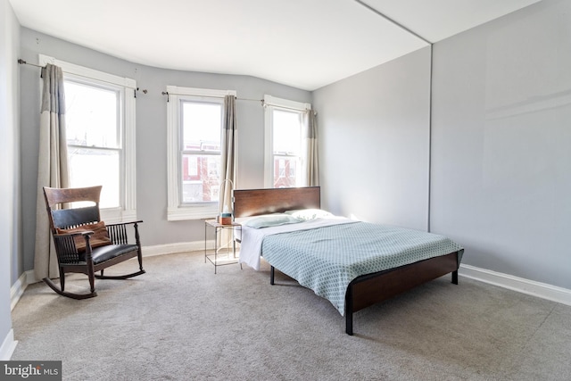 bedroom with light carpet