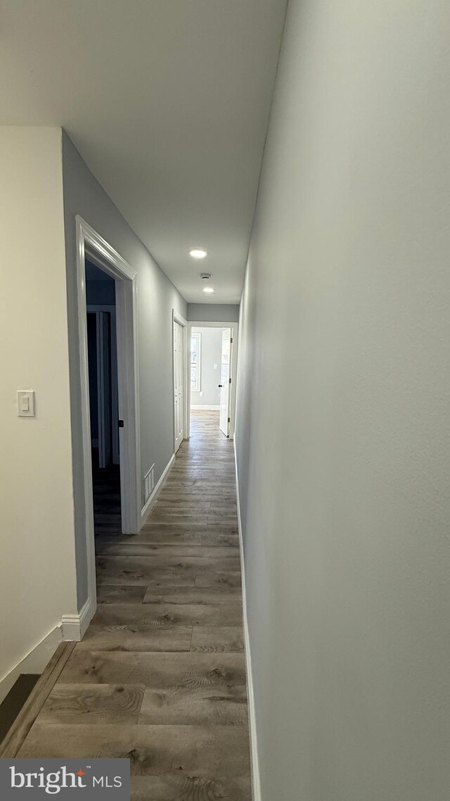 hall featuring hardwood / wood-style floors