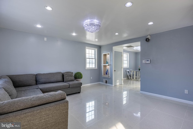 living room with a chandelier