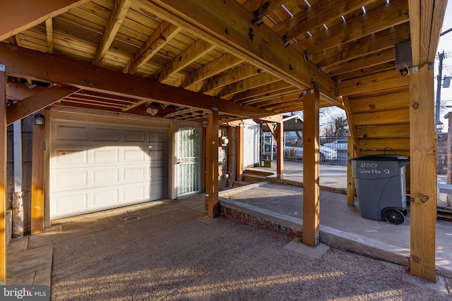 view of patio / terrace with a garage