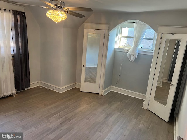 interior space featuring ceiling fan and wood-type flooring