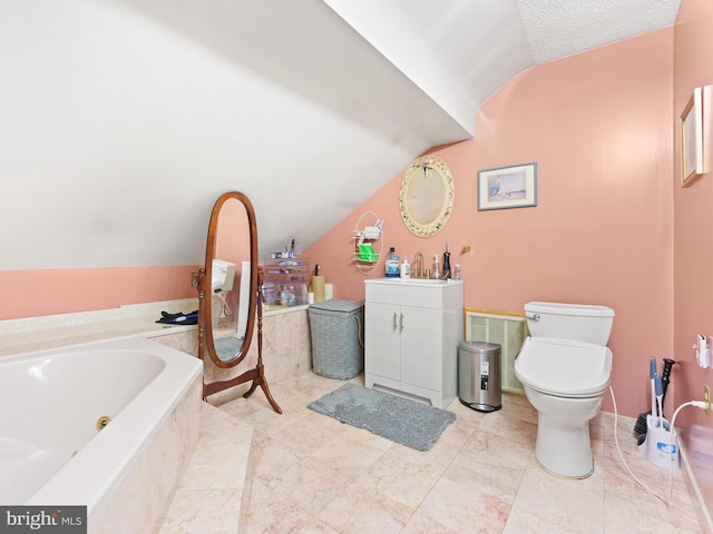 bathroom with vanity, toilet, lofted ceiling, and tiled tub