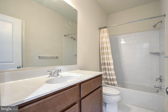 full bathroom with shower / tub combo with curtain, vanity, toilet, and tile patterned floors