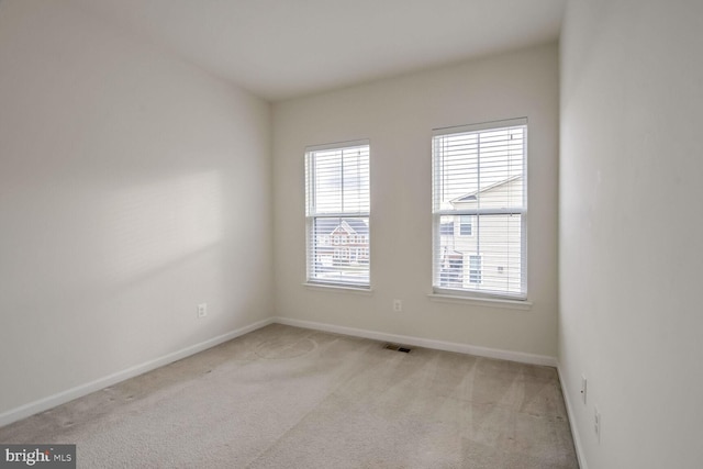 view of carpeted spare room